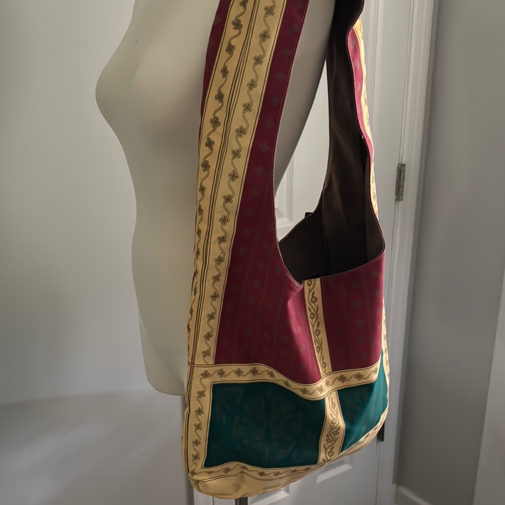 Vibrant Red and Green Hobo Bag with Stylish Trim